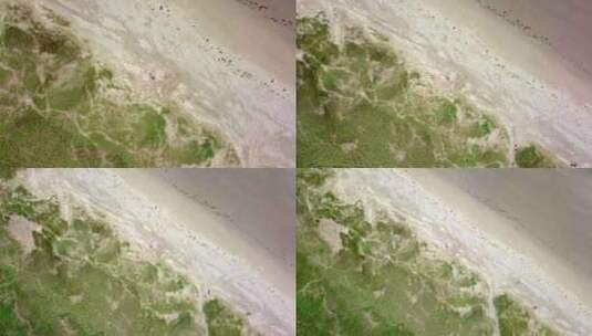 威尔士哈莱克海滩的阿里尔景观，有广阔的沙滩和沙丘。无人机拍摄高清在线视频素材下载