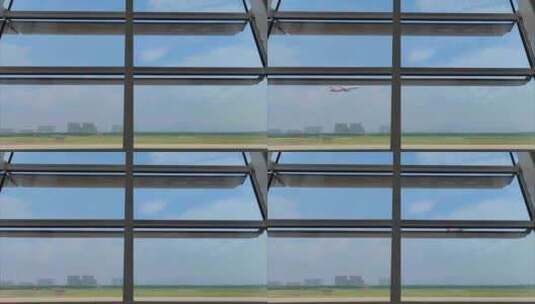 福建厦门高崎国际机场航站楼外起飞的航班高清在线视频素材下载