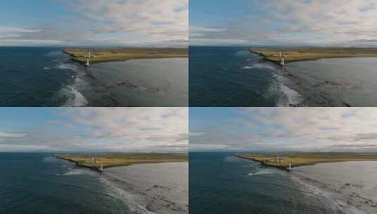 冰岛加尔乌尔老灯塔的鸟瞰图，对着太阳拍摄高清在线视频素材下载