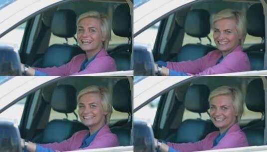 女人坐在车里微笑高清在线视频素材下载