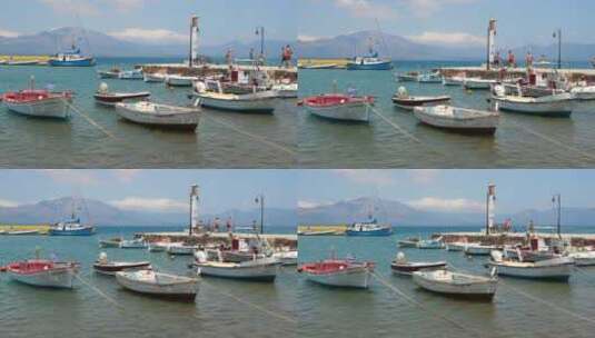希腊岛码头附近的渔船。旅游概念。旅游背景。帆船高清在线视频素材下载