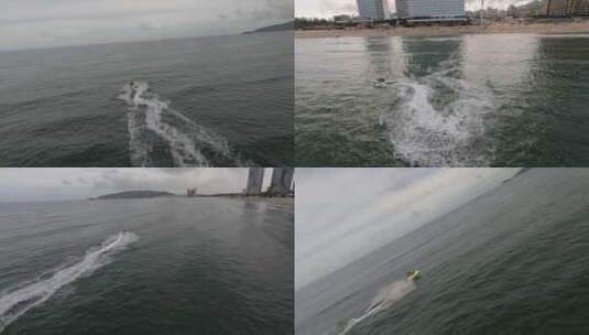 fpv穿越机追摩托艇航拍双月湾大海上娱乐高清在线视频素材下载