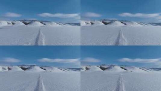 航拍呼伦贝尔山区茫茫雪原和雪路高清在线视频素材下载