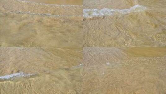 海岛阳光下海浪浪花冲刷沙滩高清在线视频素材下载