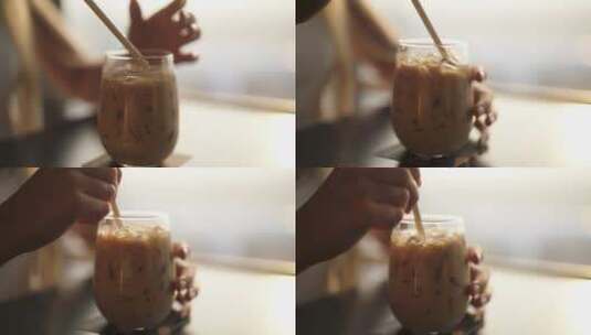 搅拌冰咖啡的镜头高清在线视频素材下载
