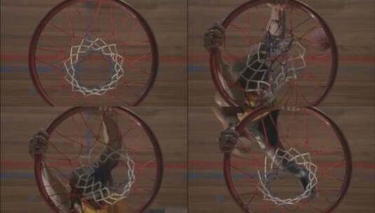 篮球运动员在球穿过后抓住篮筐高清在线视频素材下载