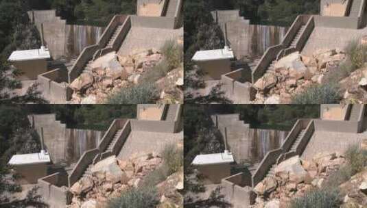 大坝溢出的水宽侧视图高清在线视频素材下载