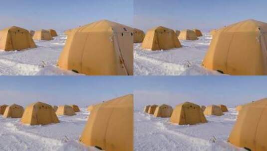 北极探险队在雪地里支起了帐篷高清在线视频素材下载