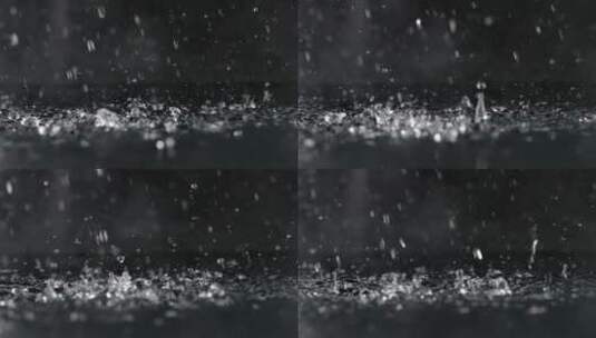 慢镜头拍摄雨滴落入水面唯美创意视频高清在线视频素材下载