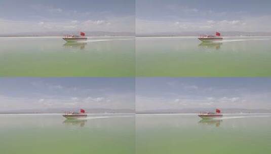 青海茶卡盐湖 绿色 唯美 湖水 船 国旗高清在线视频素材下载