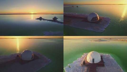 航拍青海格尔木市察尔汗盐湖北极屋日落景色高清在线视频素材下载