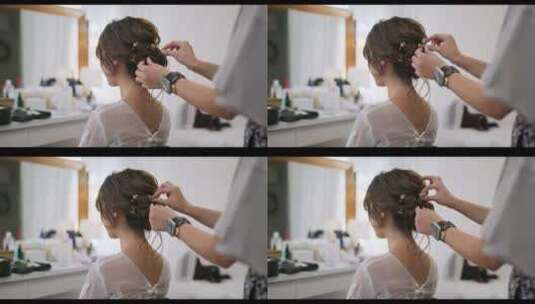理发师在为新娘创造发型高清在线视频素材下载