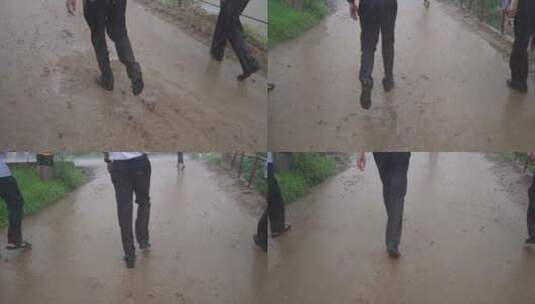 在雨天泥泞的路上行走4K素材高清在线视频素材下载