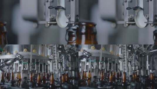 啤酒厂啤酒灌装生产线 啤酒瓶封盖高清在线视频素材下载