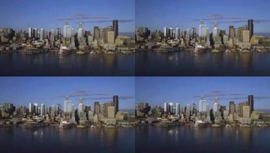 从海上鸟瞰西雅图城市景观，美国西北部日出——下降，无人机拍摄高清在线视频素材下载