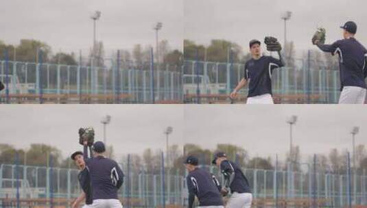 大学体育两名棒球运动员在一场成功的棒球投手比赛后互相击掌高清在线视频素材下载