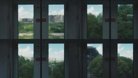 地铁轻轨窗外的风景高清在线视频素材下载