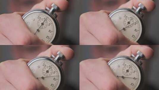 秒表在男性手中倒计时秒高清在线视频素材下载