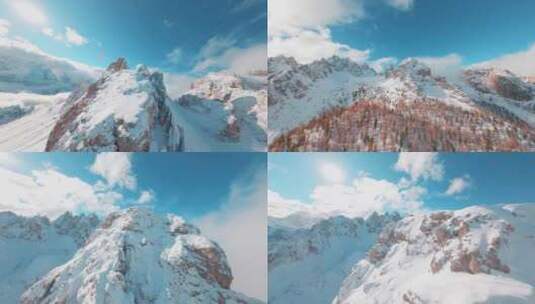 FPV航拍冬季雪山森林雪松山峰高山雪景高清在线视频素材下载
