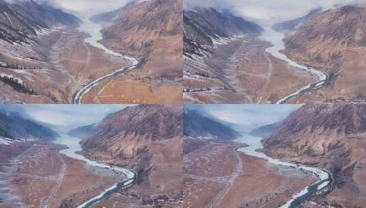 新疆昭苏玉湖冰面雪山峡谷航拍风景高清在线视频素材下载