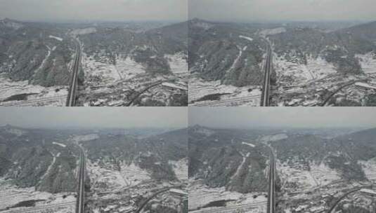 大山中的高速公路雪景航拍高清在线视频素材下载