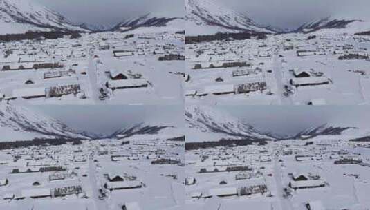 航拍冬季新疆阿勒泰禾木雪景雪山森林村落高清在线视频素材下载