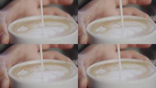 咖啡拉花的慢镜头高清在线视频素材下载