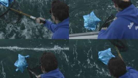 打捞海上漂浮的气球高清在线视频素材下载