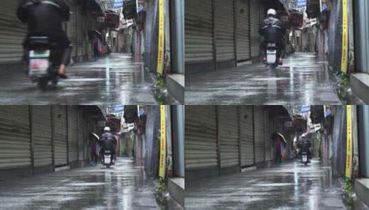 下雨天巷子街道行人电动车高清在线视频素材下载