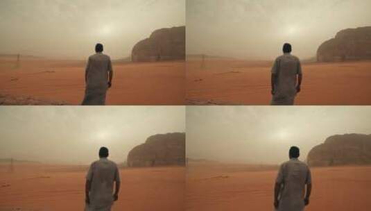 在沙漠上凝望的男人高清在线视频素材下载