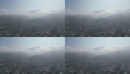 航拍城市清晨山间云雾缭绕高清在线视频素材下载
