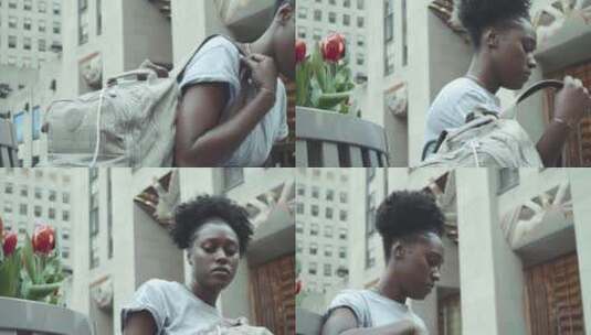城市里美丽的黑人女孩高清在线视频素材下载