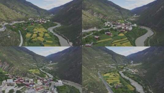 航拍川藏公路旁的藏族村庄高清在线视频素材下载