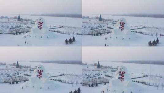 哈尔滨江边大雪人航拍高清在线视频素材下载