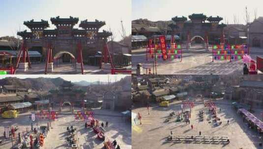 北京冬季古北水镇航拍小广场热闹气氛高清在线视频素材下载