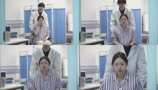 男医生推着轮椅上的女病人高清在线视频素材下载