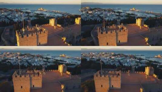 日落时希腊城市罗兹城堡顶部的航拍高清在线视频素材下载