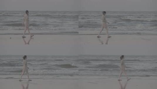 4k a7s3灰片升格拍摄 海边行走的女孩高清在线视频素材下载