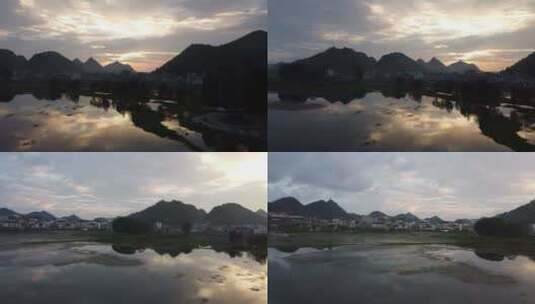 航拍贵州山水小镇绝美落日大气夏日风光高清在线视频素材下载