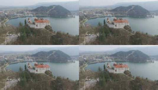 空中镜头布莱德城堡的背景是布莱德湖。斯洛文尼亚高清在线视频素材下载