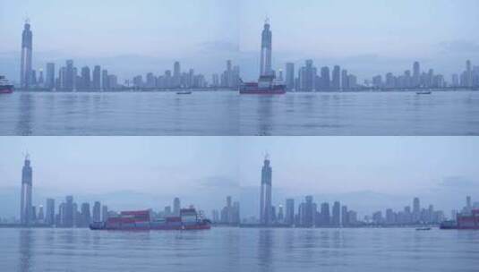武汉武昌长江边绿地金融中心亮灯货船驶过高清在线视频素材下载