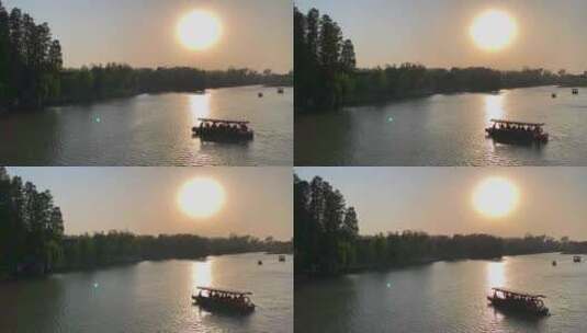 扬州瘦西湖夕阳游船湖面荡漾高清在线视频素材下载