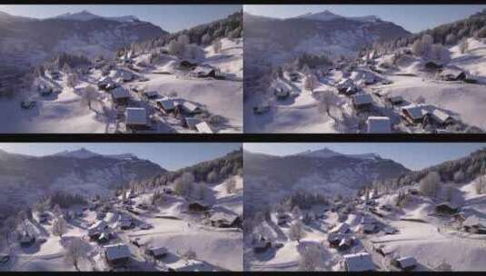4K航拍新疆冬季雪乡雪景森林村庄蘑菇屋高清在线视频素材下载