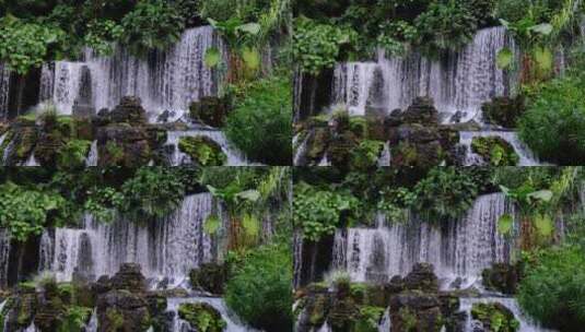 园林景观假山瀑布流水高清在线视频素材下载