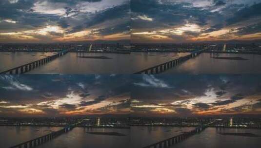 高铁跨江大桥史诗级日落火烧云航拍延时高清在线视频素材下载