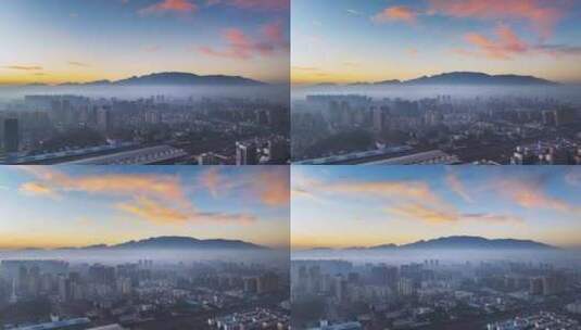 朝霞天空下的九江城景航拍延时高清在线视频素材下载