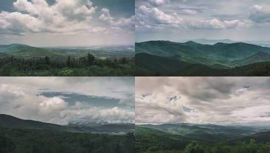 蓝天白云下的大片绿色森林山顶延时群山脉高清在线视频素材下载