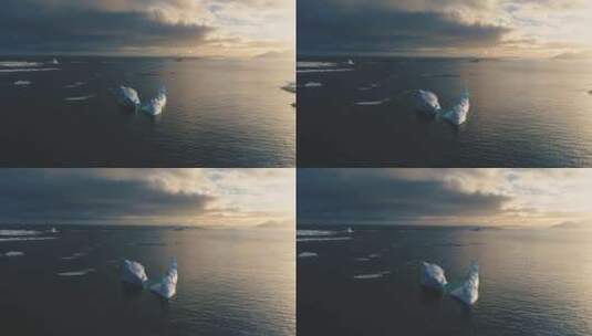 南极洲上空日落时的雪山。正面空中跟踪视图高清在线视频素材下载
