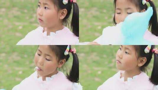 吃棉花糖可爱微笑小女孩高清在线视频素材下载