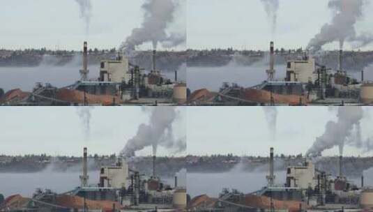 塔科马造纸厂的工业堆栈冒出滚滚白烟。空气高清在线视频素材下载
